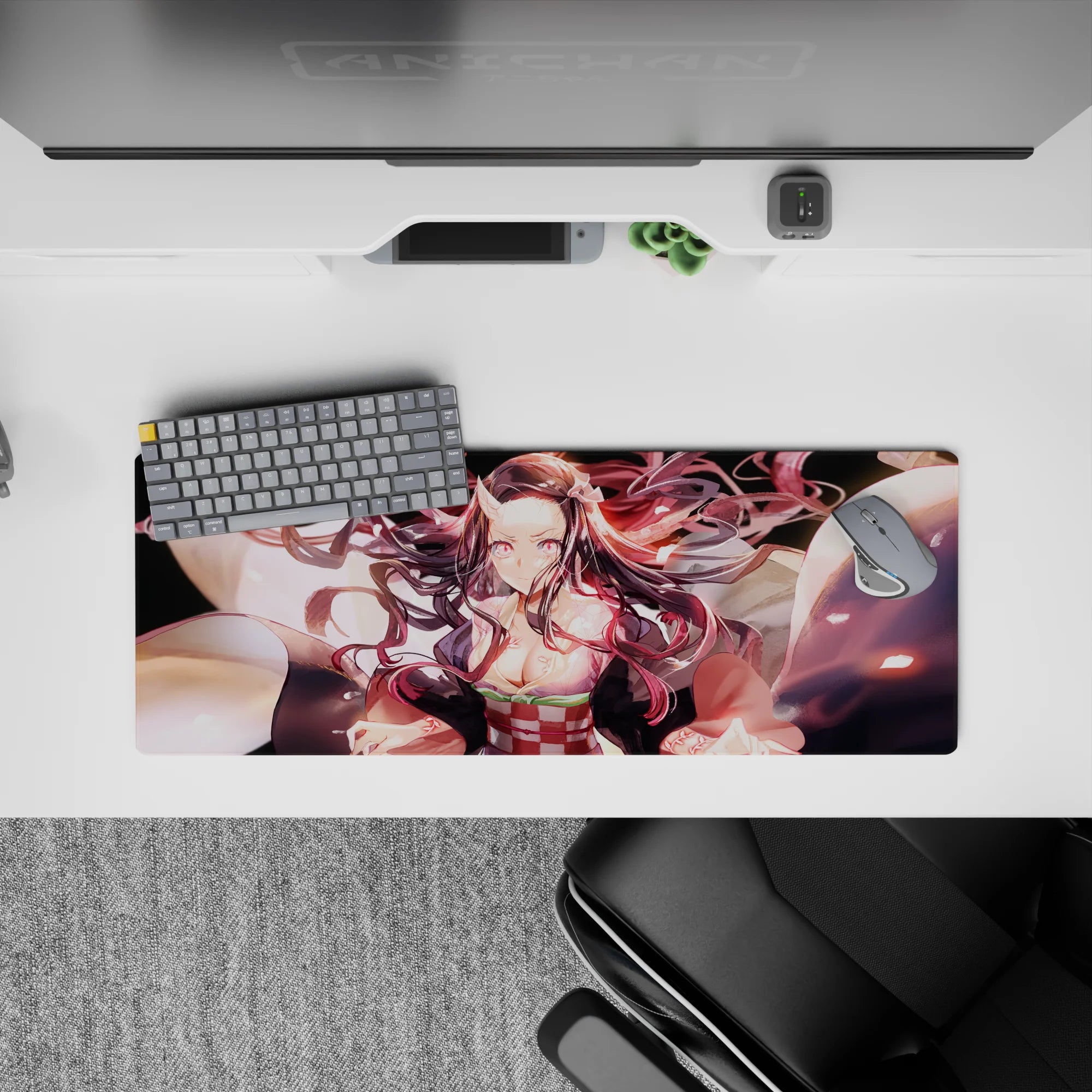 Nezuko demon form mouse pad 32x12 inches, showcasing her mid-transformation with glowing pink eyes and swirling hair.