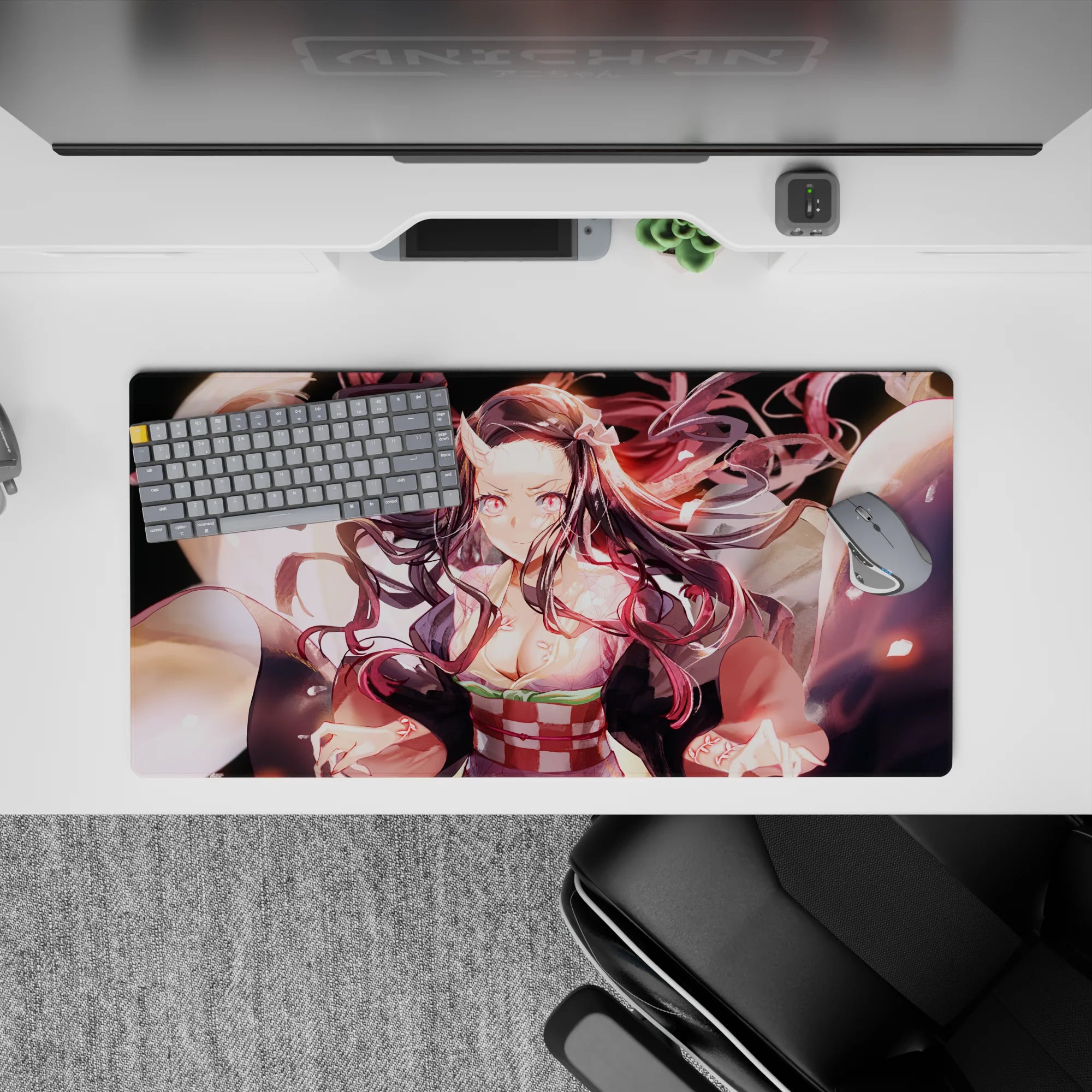 Nezuko demon form mouse pad, 32x16 inches, featuring her transformation with glowing pink eyes and swirling hair from Demon Slayer.