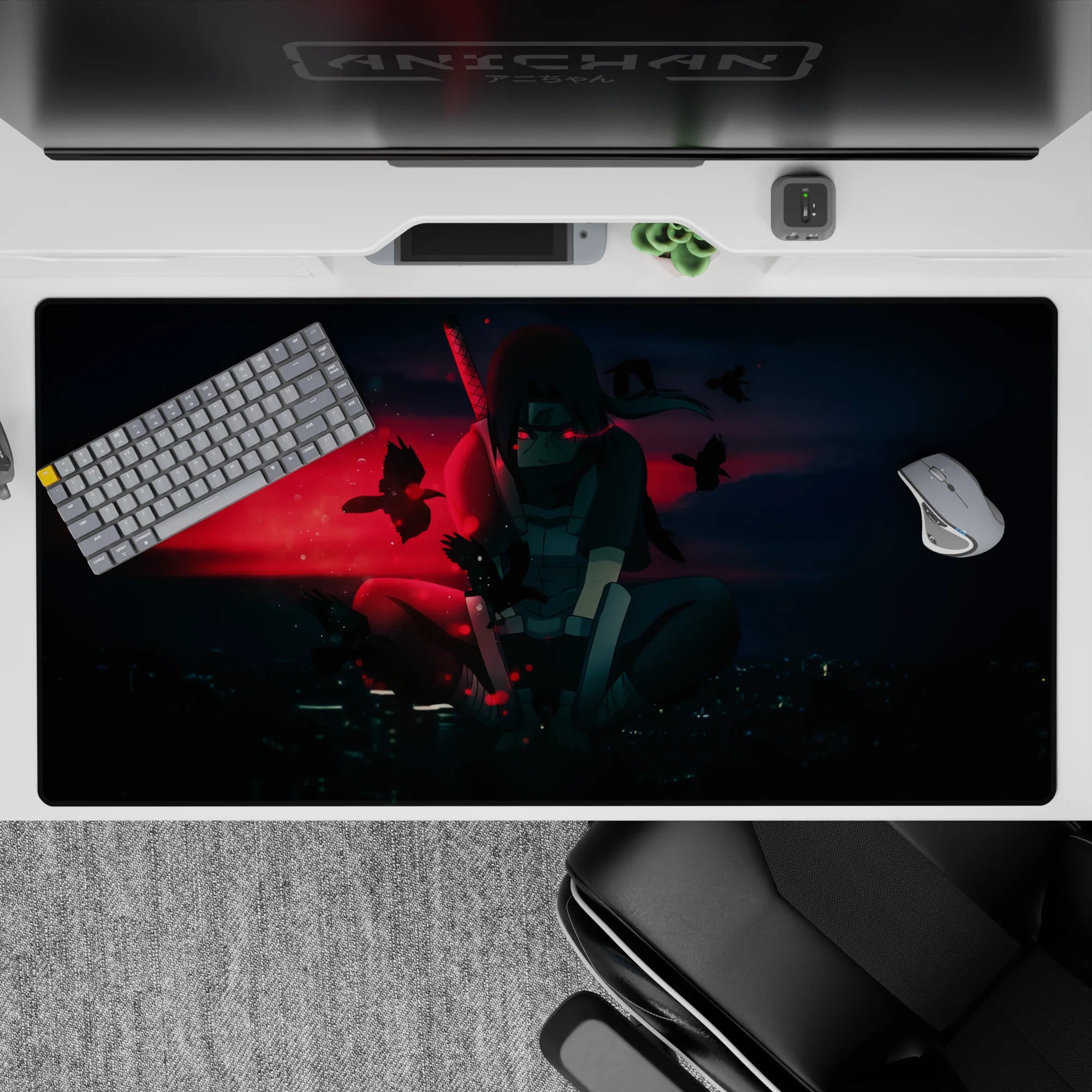 Anime desk pad 40x20 inches featuring Itachi Uchiha from Naruto, with crows, glowing city skyline, and red haze.