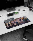 28x12 inches anime girl mouse pad showing pink-haired girl posing by train door with bandmates and gear.