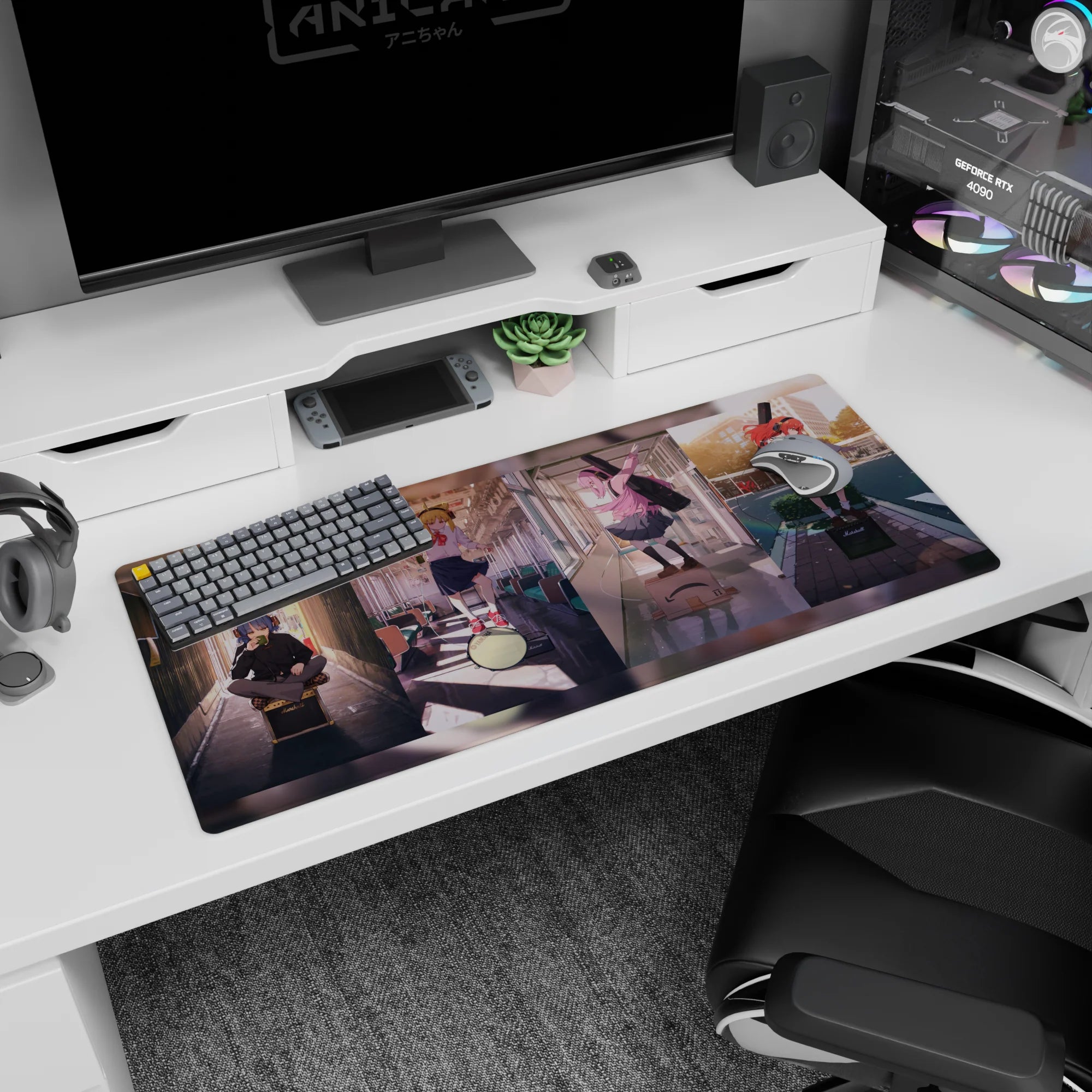 36x16 inches anime desk pad showing pink-haired girl posing by train door as friends lounge on amp and drum.