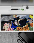 Anime mouse pad 32x16 inches featuring Team 7 from Naruto with Naruto, Sasuke, Sakura, and Kakashi on a village backdrop.