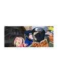 Anime mouse pad 28x12 inches featuring Team 7 from Naruto with Naruto, Sasuke, Sakura, and Kakashi against a village backdrop.