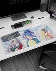 36x16 inches anime girl desk pad featuring blue-haired jersey girl with kanji, flanked by silver and blonde.