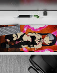Neon pink energy rings on warm orange steel floor, anime desk pad 36x16 inches for gaming mood.