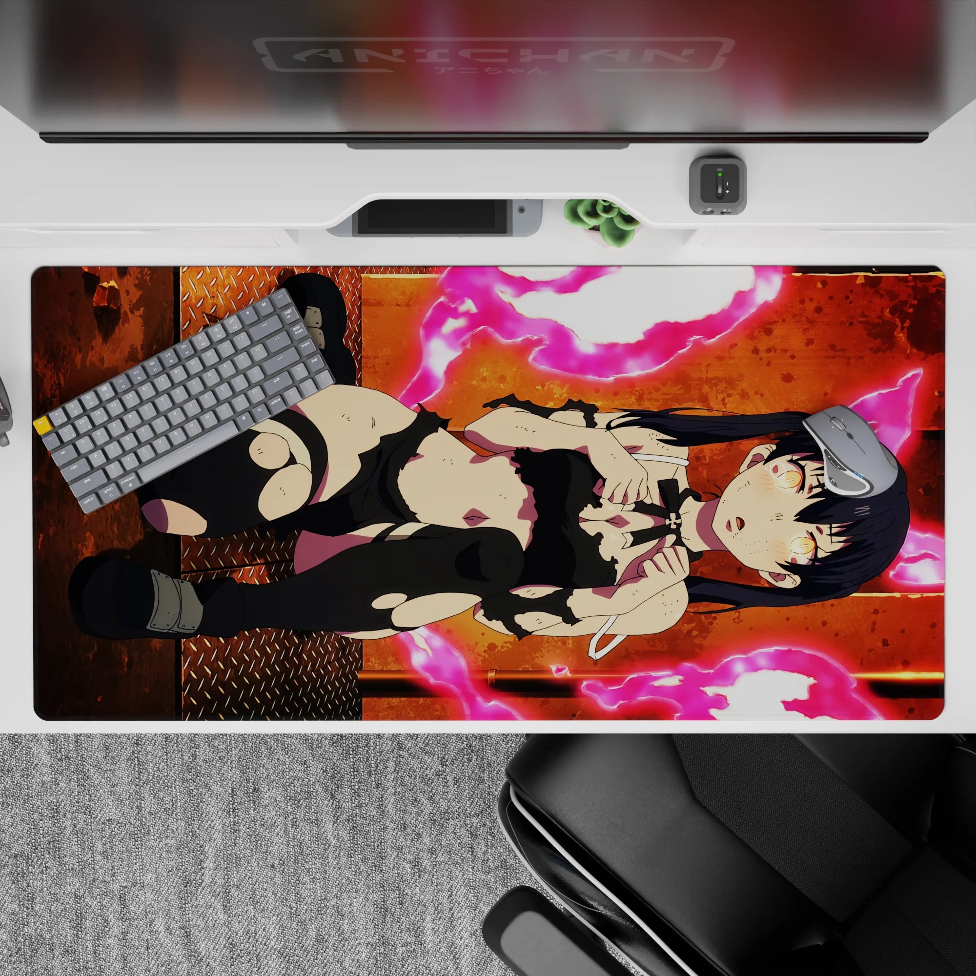 Neon pink energy rings and warm orange glow on anime girl desk pad 40x20 inches for late-night gaming vibe.
