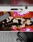 Neon pink energy rings and warm orange glow on anime girl desk pad 40x20 inches for late-night gaming vibe.