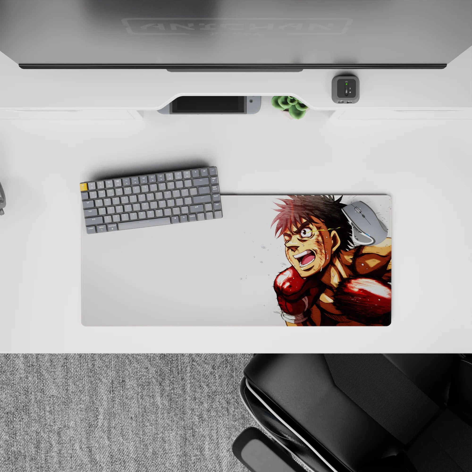 28x12 inches anime mouse pad in bold reds and warm skin tones, energetic speed lines on crisp white.