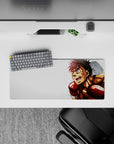 28x12 inches anime mouse pad in bold reds and warm skin tones, energetic speed lines on crisp white.