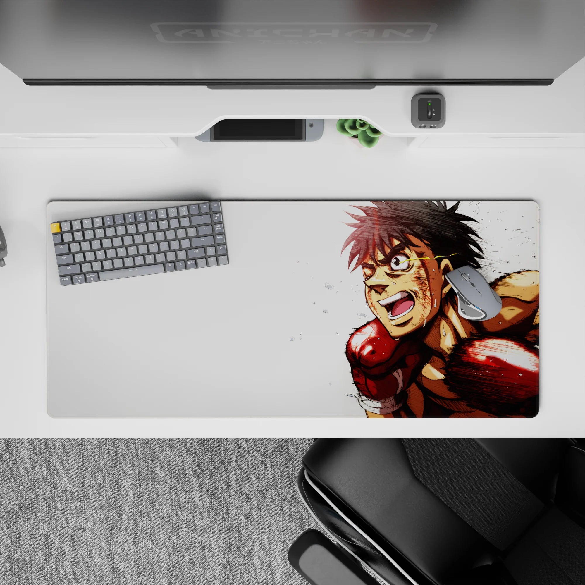 High-energy 36x16 inches anime desk pad in bold reds and warm tones on crisp white, action vibe.
