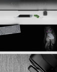 36x16 inches anime desk pad in sleek grayscale noir with neon violet glowing eyes, moody cyber vibe.