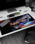 Revy from Black Lagoon desk pad 40x20 inches, mid-action with twin pistols, sharp grin, denim shorts.