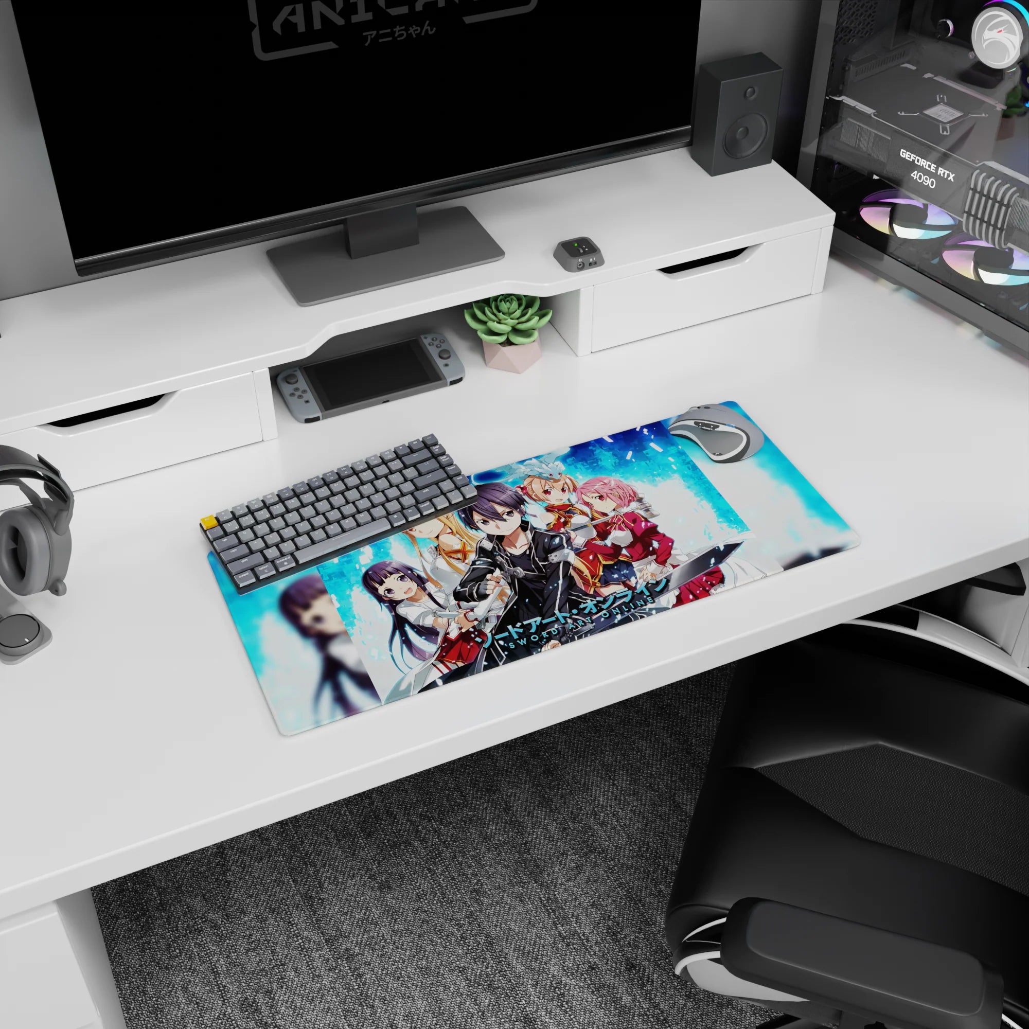 Sword Art Online mouse pad 28x12 inches featuring Kirito, Asuna, Silica, and Lisbeth in pixelated blue and digital fire.