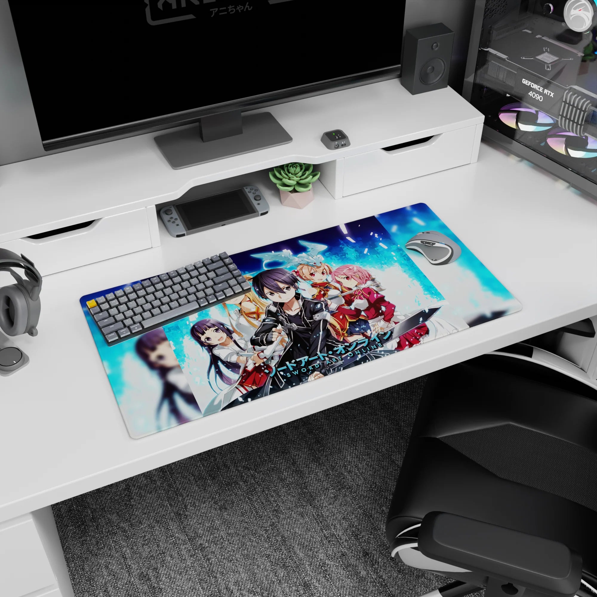 Sword Art Online mouse pad 32x16 inches featuring Kirito, Asuna, Silica, Lisbeth, and Yui in vibrant pixelated blue.