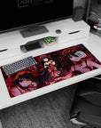 Kurumi Tokisaki anime desk pad 36x16 inches, twin tails in ribbons, pointing a pistol amid rose petals.