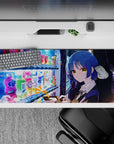 36x16 inches anime desk pad in calming neon blues and warm city glow with candy-colored reflections.