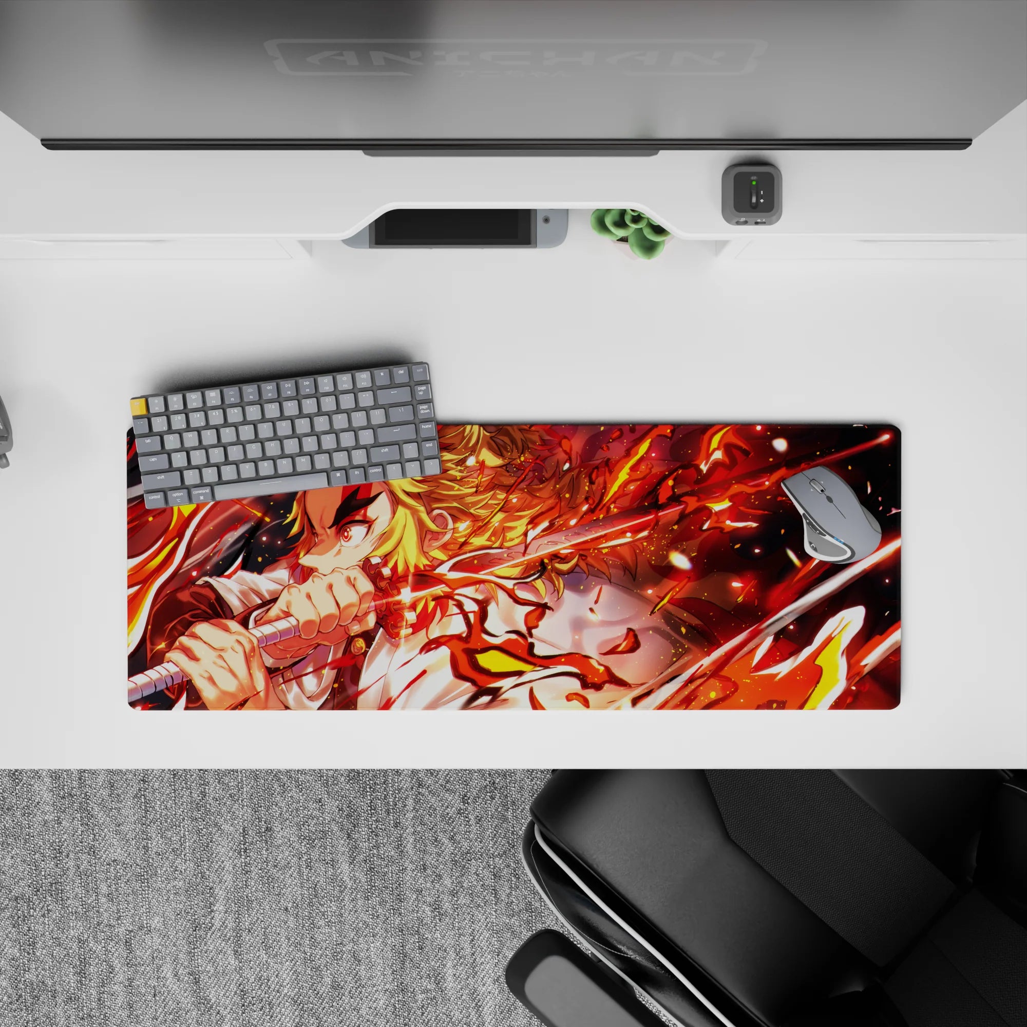 Rengoku from Demon Slayer anime mouse pad 32x12 inches, showing him wielding a fiery katana with dynamic flames.