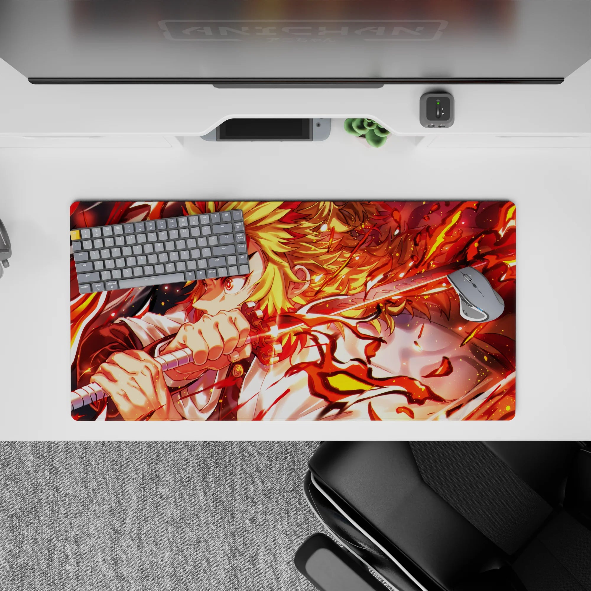 Rengoku from Demon Slayer on a 32x16 inch anime mouse pad, flames and katana details, vivid colors energize your desk.