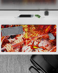 Rengoku from Demon Slayer on a 32x16 inch anime mouse pad, flames and katana details, vivid colors energize your desk.