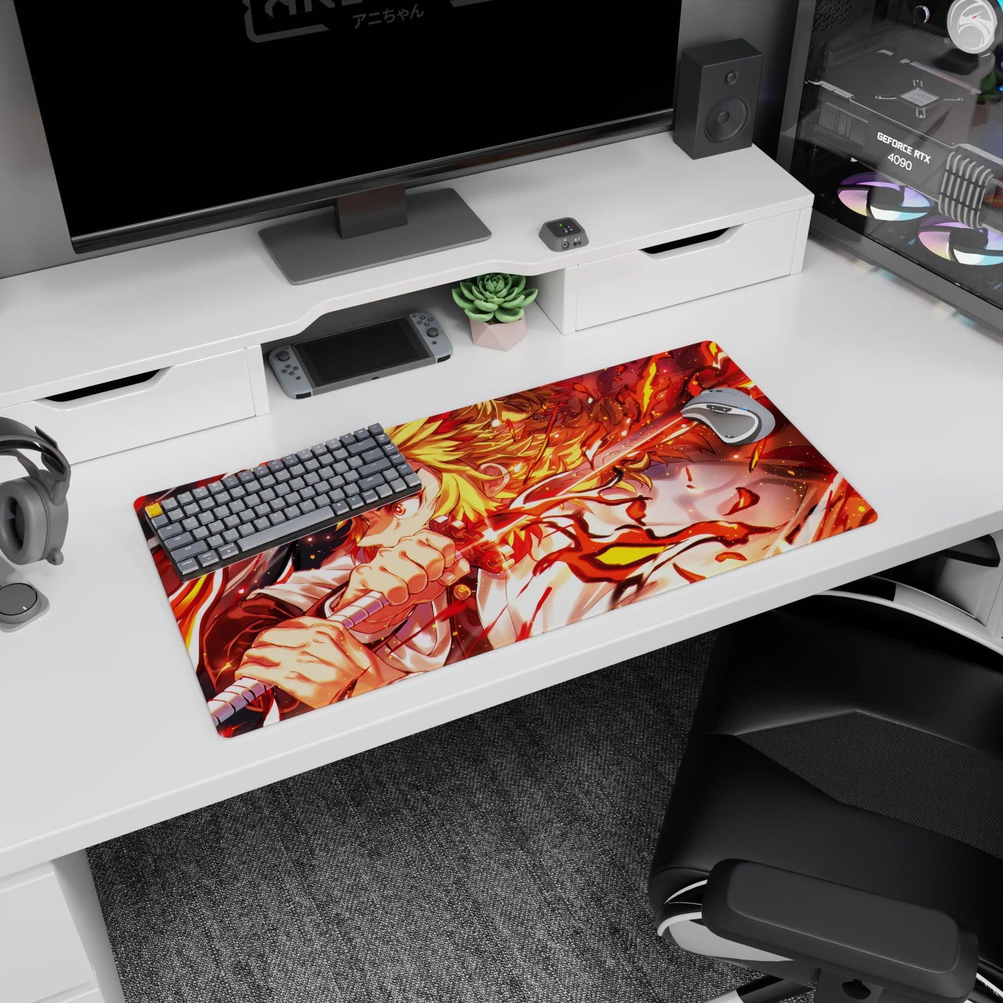 Rengoku from Demon Slayer on a 32x16 inch anime mouse pad, his fiery katana ablaze in red and gold, exuding dynamic energy.