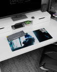 Blue-haired anime girl leaning back with folded arms on a 28x12 inches mouse pad by a pale window.