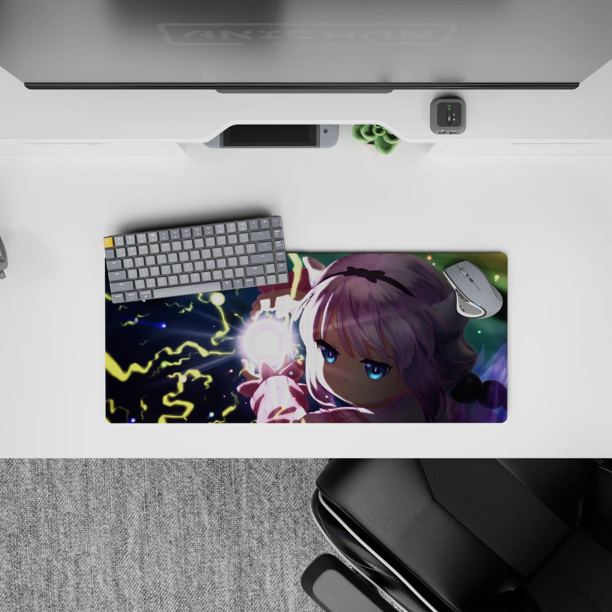 28x12 inches desk mat in midnight tones with neon yellow lightning, icy blues, and cozy pink sleeves.