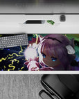 36x16 inches desk pad in midnight tones with neon yellow lightning, icy blue eyes, and stormy magical vibe.