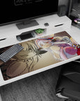 Wide-eyed chibi adventurer in fluffy gear with tiny fangs, red hat and goggles on 40x20 inches desk pad.