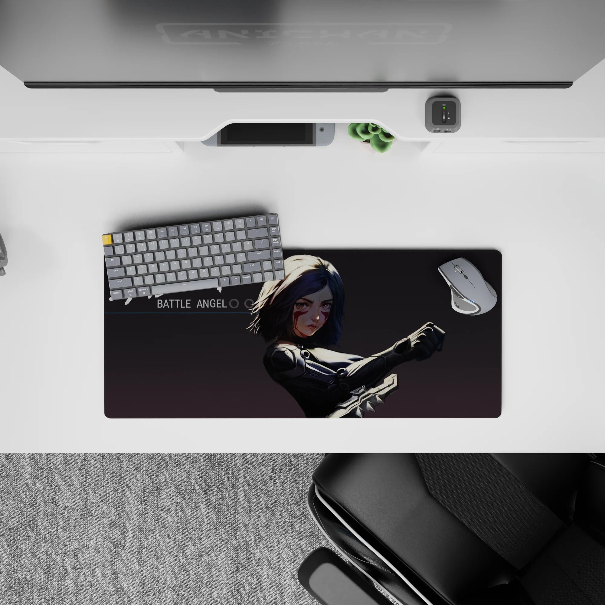 Anime girl mouse pad 28x12 inches in cool gray shadows, high contrast black armor and crimson face streaks.
