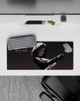 Anime girl mouse pad 28x12 inches in cool gray shadows, high contrast black armor and crimson face streaks.
