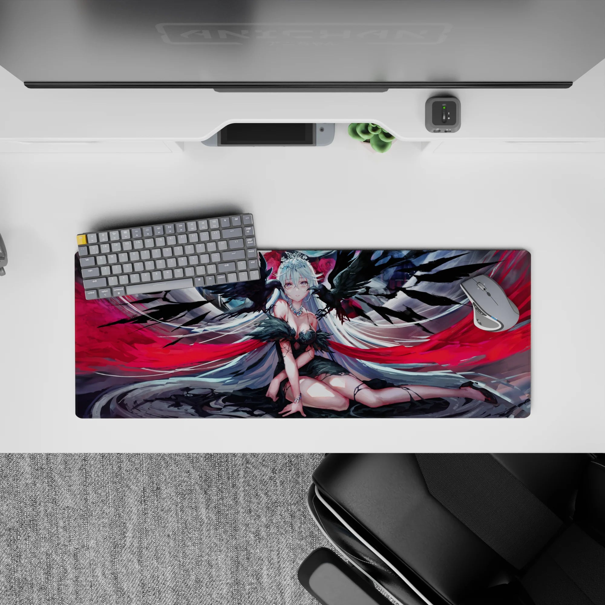 Anime girl mouse pad 32x12 inches in smoky grays, ink-black feathers, and crimson ribbons, gothic mood.