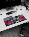 28x12 inches anime girl mouse pad showing a winged silver-haired angel lounging in black feathers and red ribbons.