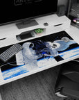 Astronaut in white reaching for angel-wing anime girl with flowing silver hair on desk pad, 40x20 inches.