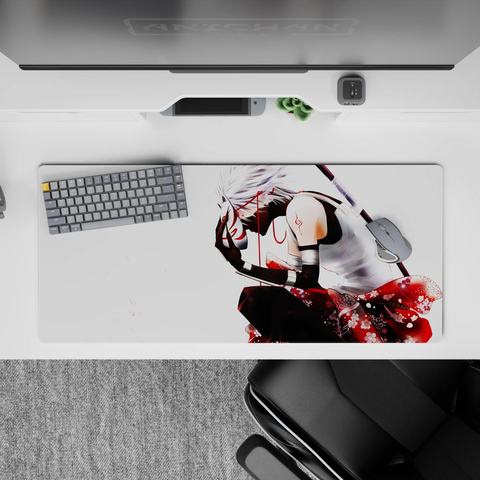 Moody 36x16 inches anime desk pad in silky blacks with vivid reds and delicate floral accents.