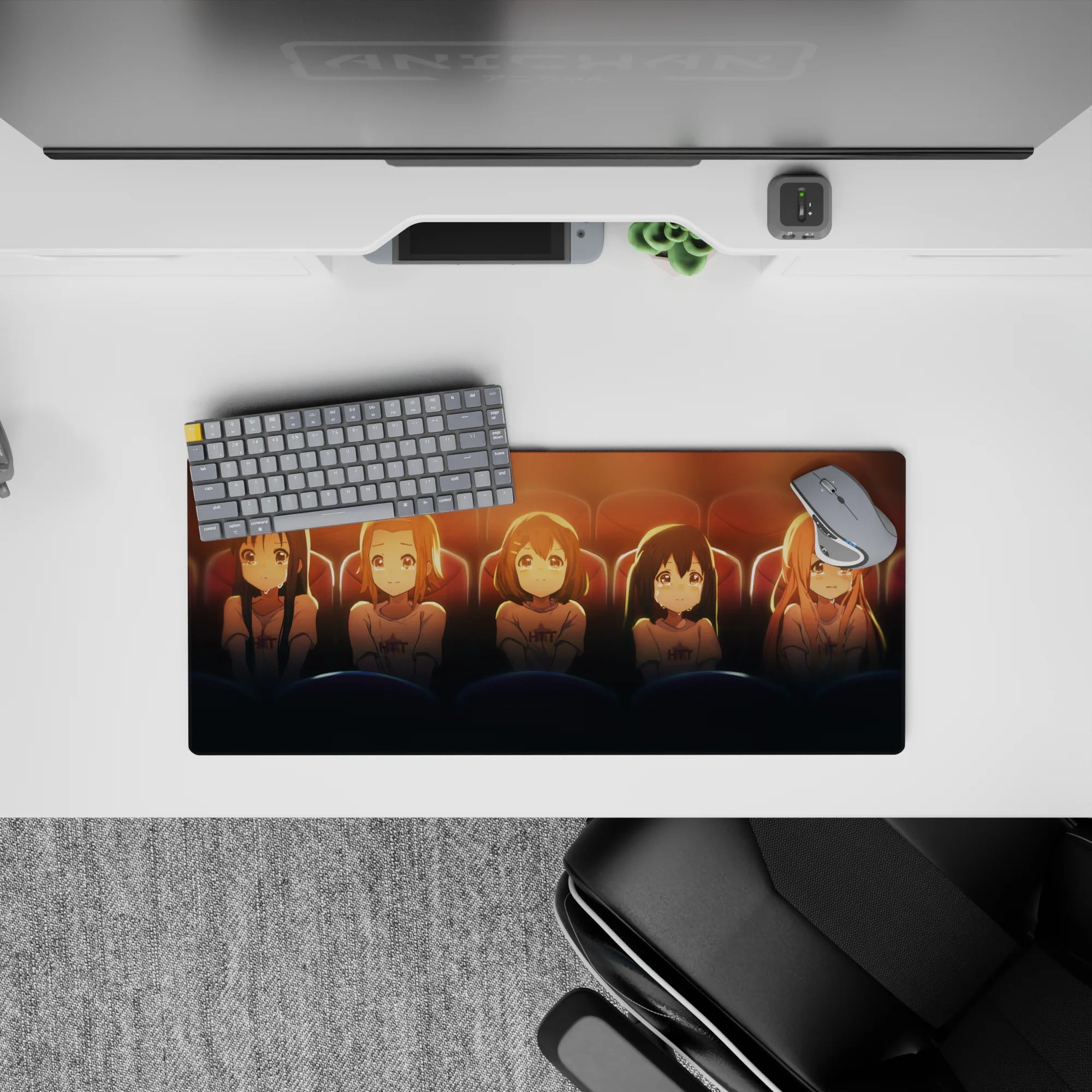 Warm amber and cocoa anime girl mouse pad 28x12 inches with deep blue seats and soft rim glow.