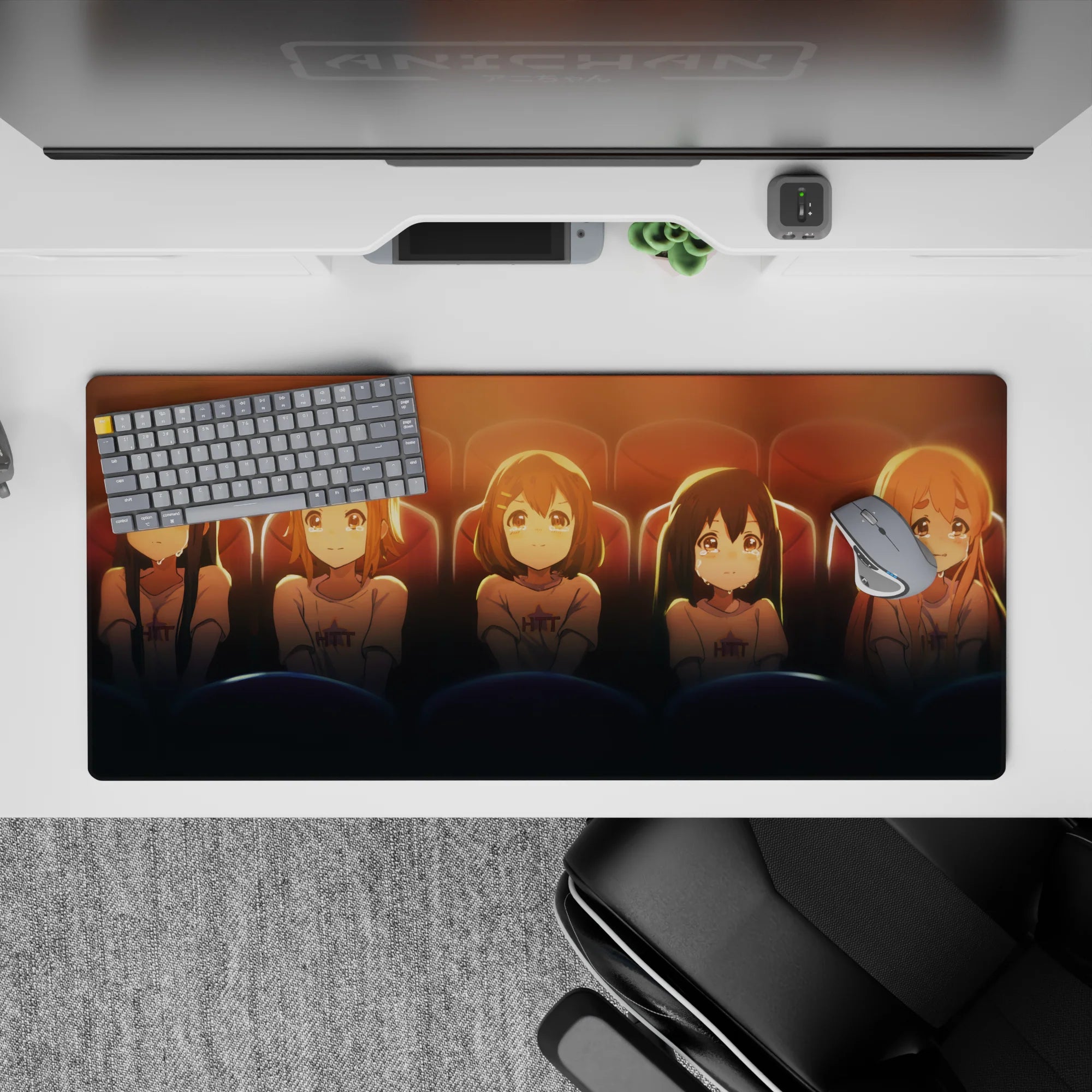 Warm amber and cocoa anime girl desk pad 36x16 inches, soft sunset glow and cozy movie-night mood.
