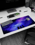 Anime desk pad 36x16 inches with dreamy skies, silhouettes, and galaxy in purples and blues for a cosmic escape.
