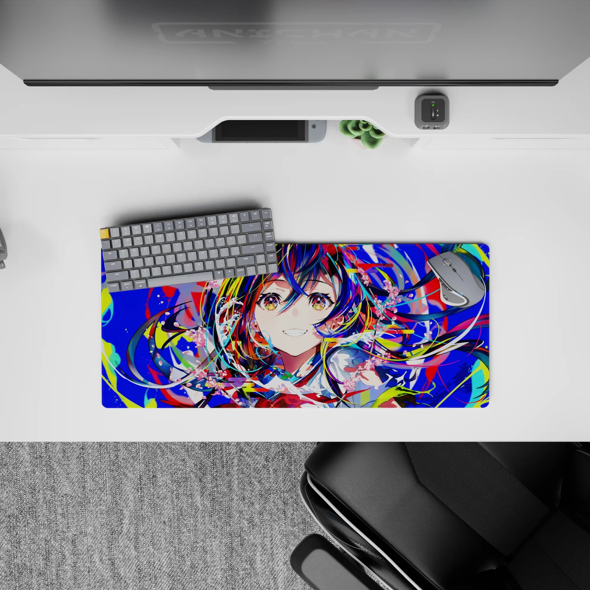 Vibrant neon blues, hot reds, lime splashes, and candy-pink petals on a 28x12 inches anime mouse pad.
