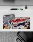 28x12 inches anime girl mouse pad in fiery reds and flame accents, bold high-contrast highlights.