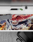 36x16 inches anime desk pad in fiery reds and orange glow, bold glare, steel highlights, cute adventurer vibe.