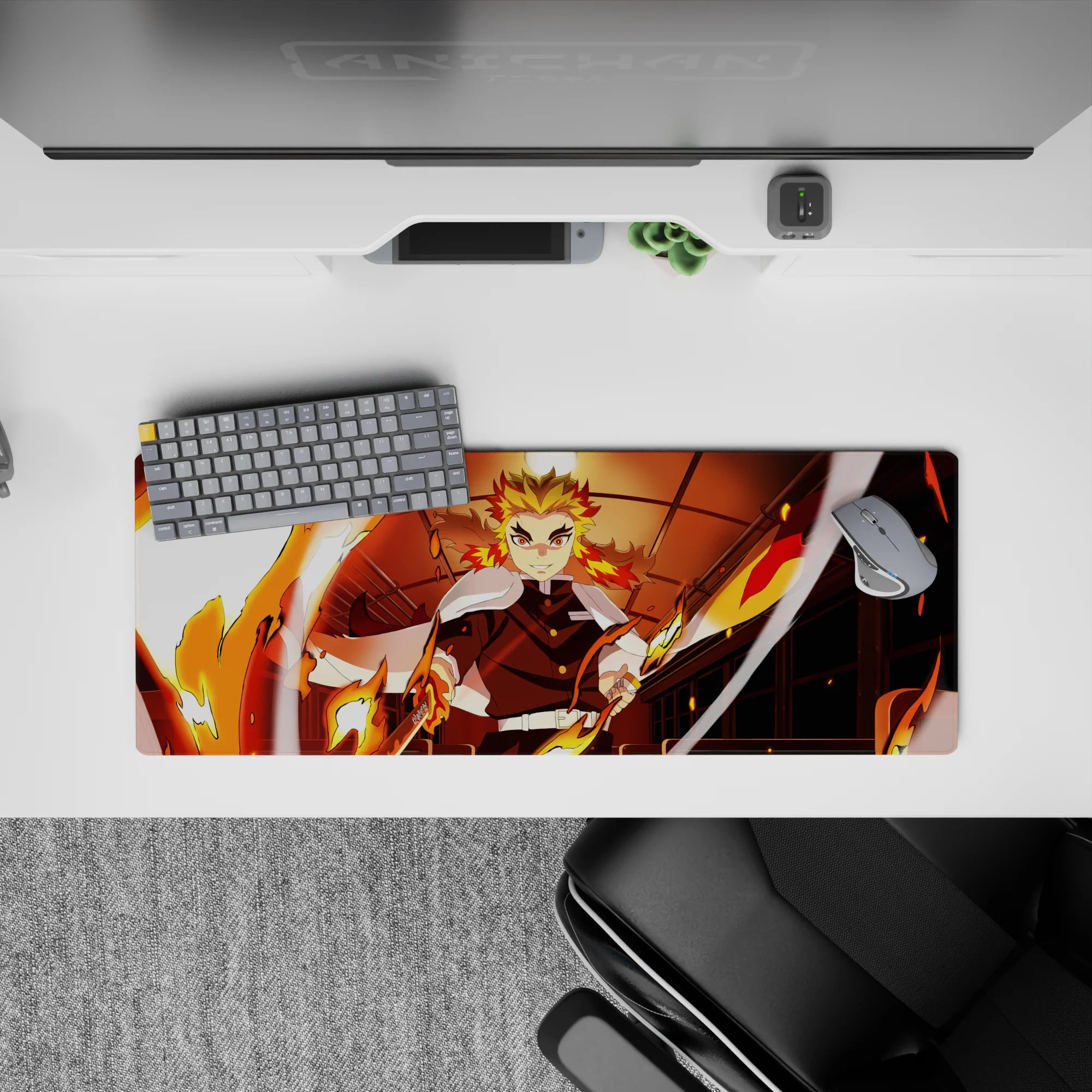 Anime mouse pad 32x12 inches featuring Kyojuro Rengoku from Demon Slayer, vibrant flames and Mugen Train backdrop.