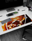 Anime desk pad 36x16 in featuring Kyojuro Rengoku from Demon Slayer, with fiery colors of orange, yellow, and crimson.