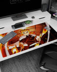 Anime desk pad featuring Kyojuro Rengoku from Demon Slayer, 40x20 inches, with fiery Mugen Train backdrop.