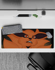 32x12 inches anime mouse pad in warm orange fox tones with dramatic shadows for a dark, intense vibe.