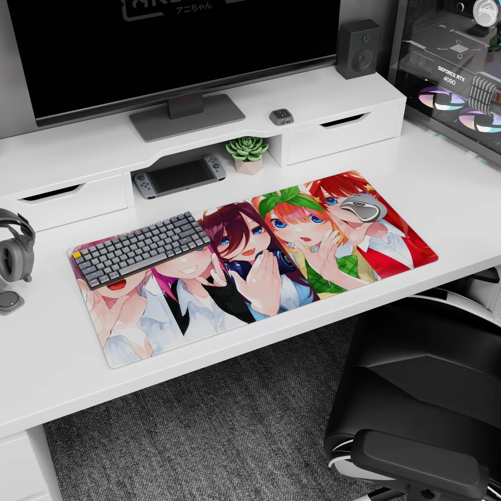 Anime girl mouse pad 32x16 inches showing five cute girls, some smiling open-mouth, one shy hand-to-lips.