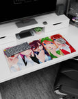 Anime girl mouse pad 32x16 inches showing five cute girls, some smiling open-mouth, one shy hand-to-lips.
