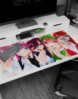 40x20 inches anime girl desk pad showing five girls lined up, one with green bow and one with star hair clip.