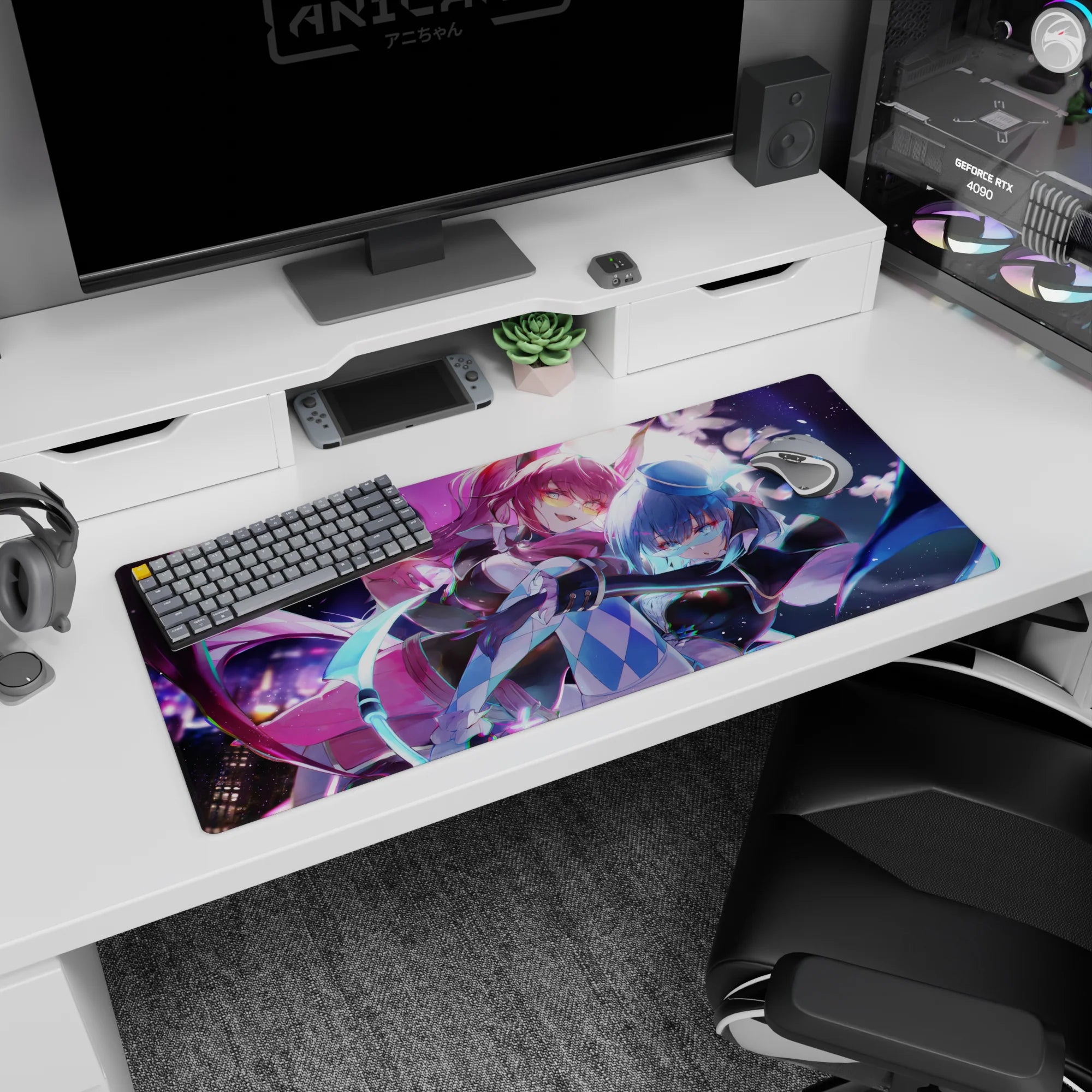 36x16 inches anime girl desk pad showing pink-haired girl with yellow glasses and blue-haired partner in top hat.