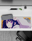 32x12 inches anime girl desk mat with navy hair, purple starry eyes on a bright orange background.