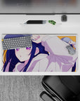 32x16 inches anime girl mouse pad with warm orange background and sparkling purple eyes for a bright desk mood.